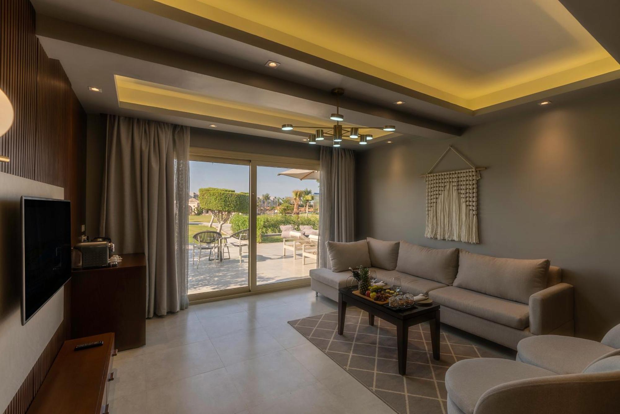 Sunrise Crystal Bay Resort -Grand Select (Adults Only) Hurghada Exterior photo A living room in a hotel